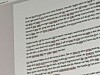 Bildet viser tekst skrevet i Word med mange røde streker under som betyr skrivefeil.